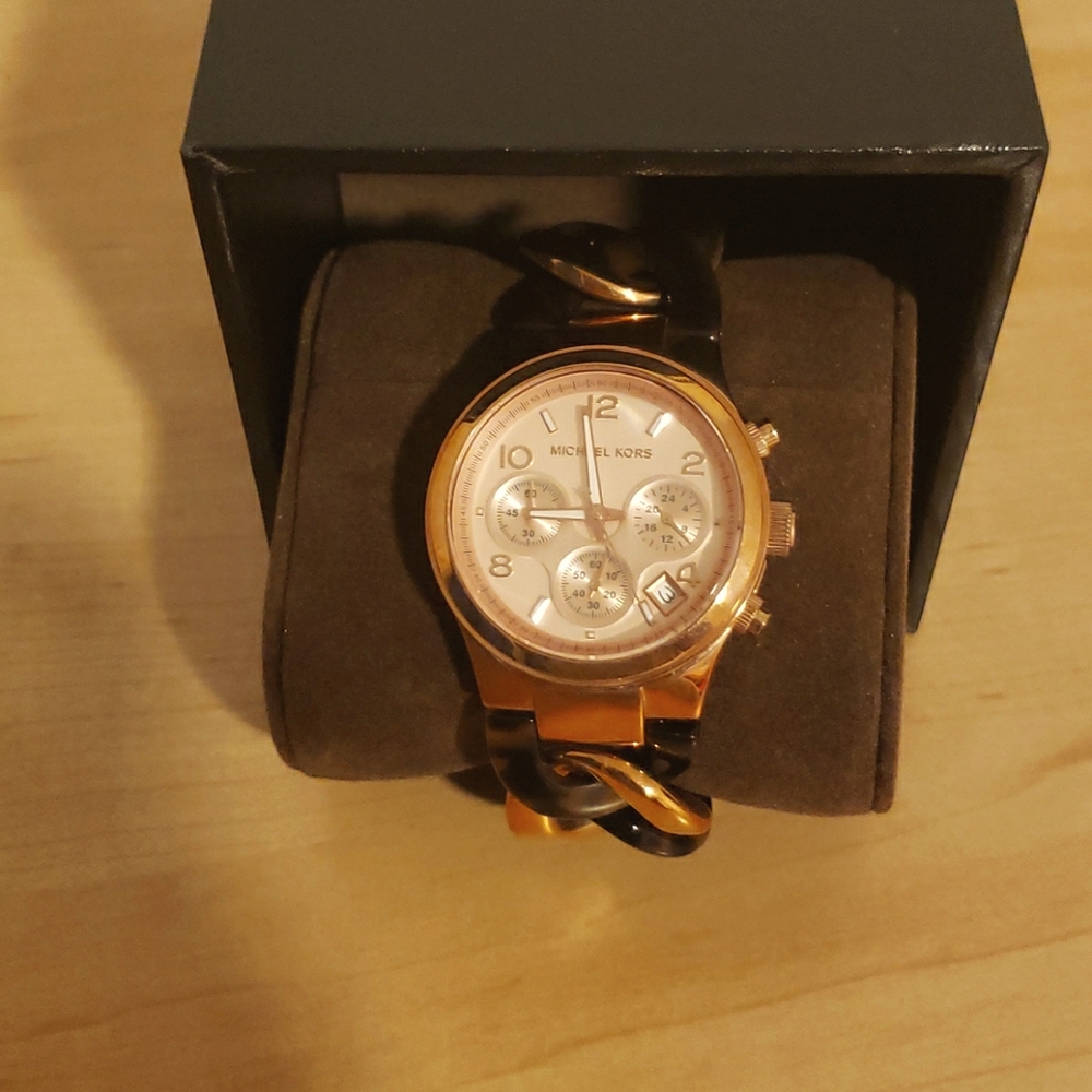MK woman's rose gold dial bracelet watch